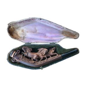 An Antique Pipe Made Of Finely Carved Wood, Depicting Three Galloping Horses In High Relief.