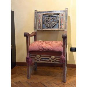 Poltrona piemontese in legno policromo con stemma araldico, fine XV secolo
