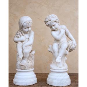 Coppia di putti allegorici in marmo di Carrara – XIX secolo