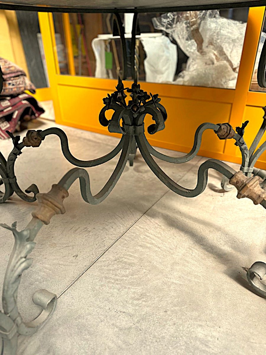 Tavolo in ferro battuto con piano in marmo verde-photo-1