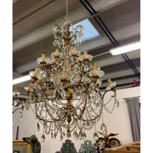 Coppia di lampadari toscani in ferro dorato