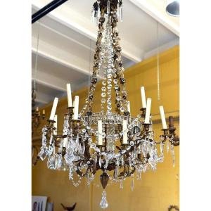 Lampadario in bronzo dorato e cristallo