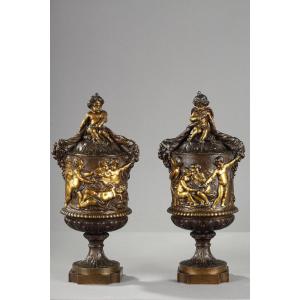 Pair Of Covered Vases, In Finely Chiseled Bronze With A Rich Rotating Decor