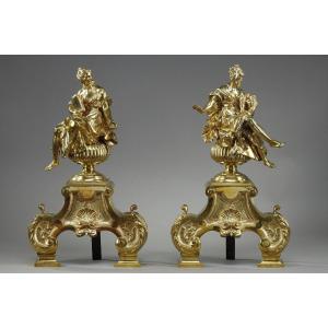 Pair Of Andirons In Gilt And Chiseled Bronze Decorated With Seated Muses