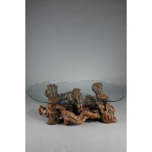 Coffee Table Made From Tree Roots With A Bean-shaped Glass Top. 