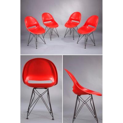 Set Of Four Red Chairs With Base In The Style Of Charles Eames