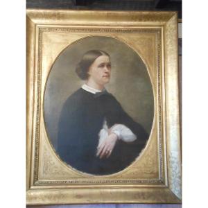 Portrait And Golden Oval Frame With Leaf
