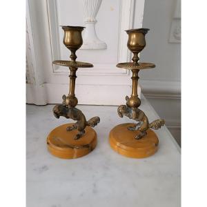 Pair Of Candlesticks Featuring Funambules Dogs
