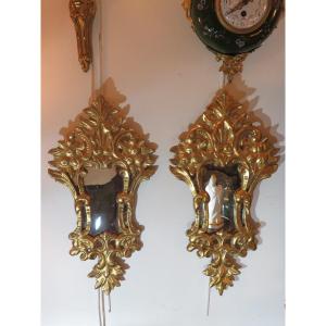 Pair Of Italian Mirrors With An Animated Shape In Carved And Gilded Wood, 20th Century