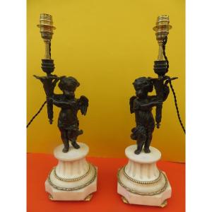 Pair Of Lamps: Bronze Cherubs Mounted On A White Marble Base Encircled With Bronze, 19th Century 