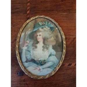 Oval Miniature Of A Woman Reading In The Louis XVI Style, Framed In Chased Brass.