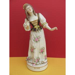 Polychrome Porcelain Statuette: 