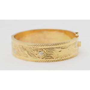 Slave Bracelet In Yellow And White Gold