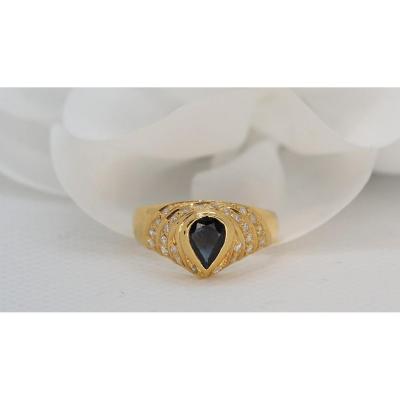 Yellow Gold Ring Set With A Pear And Diamond Sapphire