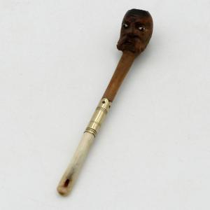 Cigarette Holder, Old Man's Head In Wood, Bones And Glass Eyes, Early 20th Century.