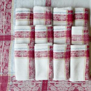Tablecloth And Twelve Napoleon III Napkins, Rich Red, Blue And Yellow Borders, 19th Century.