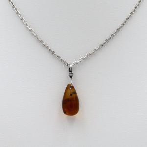 "amber Drop" Pendant On A Silver Chain, Mid-20th Century.