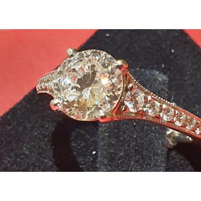 18ct Gold Ring Set With 1.34ct Diamond And Brilliant Paving