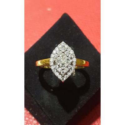 18ct Gold Marquise Ring Set With Modern Cut Diamonds Including 4 Princess Cut