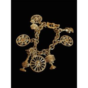 Couture Charm Bracelet From Maison Guy Laroche In Gold Metal With Forçat Links 