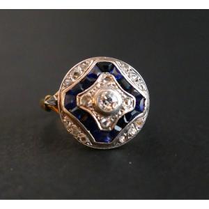 Art Deco Ring With Calibrated Diamonds And Sapphires.