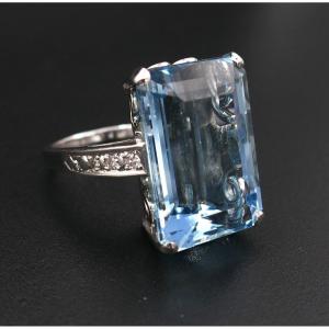 Ring Set With A Large Aquamarine Shouldered With Diamonds.