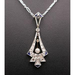 Art Deco Pendant With Calibrated Diamonds And Sapphires, White Gold And Platinum.