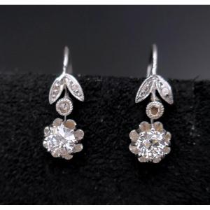 Earrings Adorned With 2 Diamonds, 0.60 Carat.