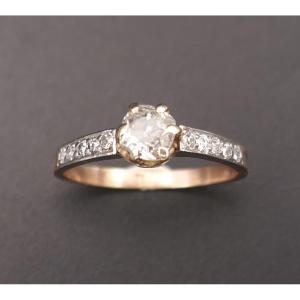 Old-cut Diamond Solitaire Ring Flanked By Diamonds.