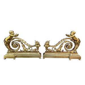 Pair Of Andirons With Arabesques In Gilt Bronze