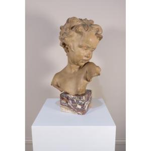 Sculpture Of A Young Child's Bust With A Scarab, Circa 1920