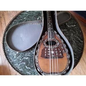 Antique Mandolin In Its Cardboard Box