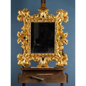 Specchiera italiana in legno con oro zecchino, periodo Luigi XIV, prima metà del XVIII secolo.