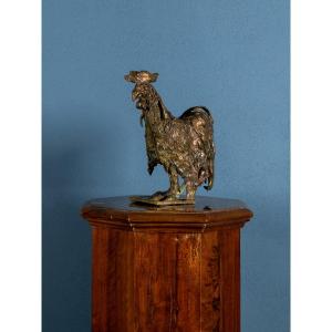 Scultura in bronzo raffigurante un gallo, firmata e datata 79