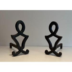 Pair Of Modernist Cast Iron And Wrought Iron Andirons. French Work By Raymond Subes. Circa 1940