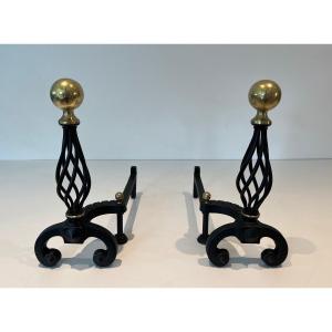 Pair Of Wrought Iron Andirons Topped With A Brass Ball. French Work. Around 1970