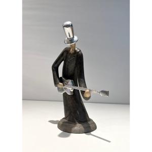 Sculpture Representing A Guitarist