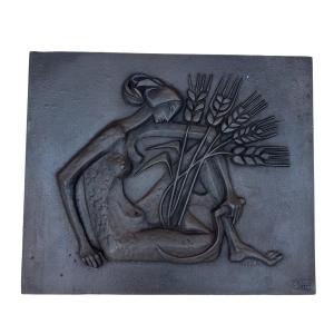 Modernist Cast Iron Fireback Representing A Nude Woman With A Scythe And Ears Of Wheat