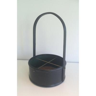 In The Taste Of Jacques Adnet. Leather And Wood Bottle Rack. Around 1950