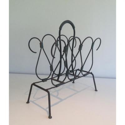 Leather And Metal Lacquered Magazine Rack. Around 1950
