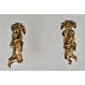 Pair Of Cornucopia Carrying Figures
