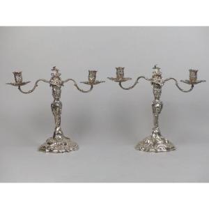 Pairs Of Two-armed Torches
