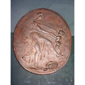 From After Clodion, Medallion In Earth From The 19th Century: Bacchante & Satyr