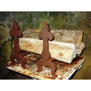 Pair Of Wrought Iron Andirons With Stylized Fleur De Lys Decor