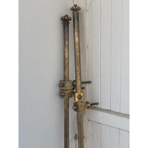 Pair Of Curtain Rods In Brass And Polished Bronze