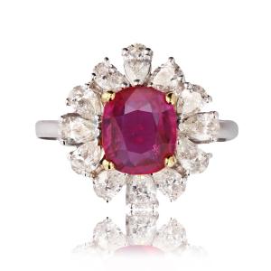 Pink Sapphire And Pear Cut Diamond Ring