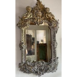   Large 19th Century Mirror In Richly Painted Wood Carved With Two Putti  