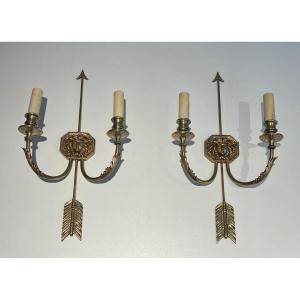 Pair Of Bronze Wall Sconces Presenting A Bronze Arrow Bearing The Effigy Of The Sun King. 