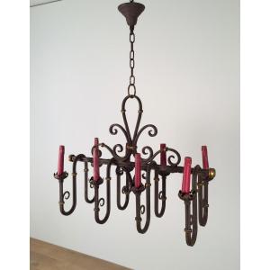 Wrought Iron Chandelier 8 Lights On. Around 1940.