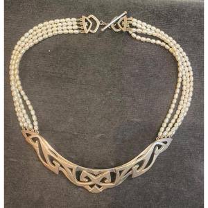 Collier Signée John âgée